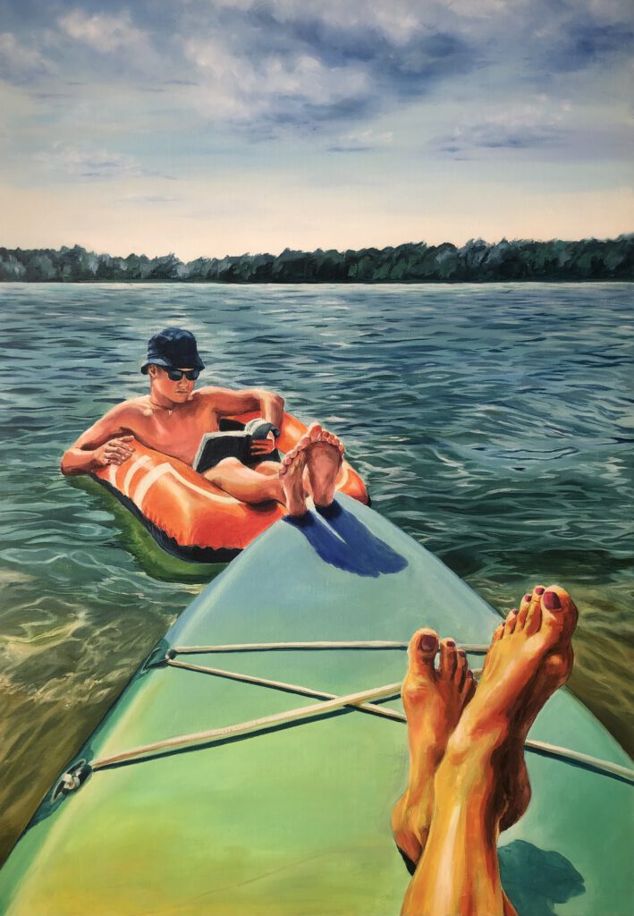 Contemporary oil painting showing a calm summer scene on a lake. A shirtless boy lies on an inflatable raft reading a book, while a pair of tanned feet rests on a kayak in the foreground. The water is still and clear, the atmosphere relaxed and sunlit, evoking leisure, stillness, and distance.