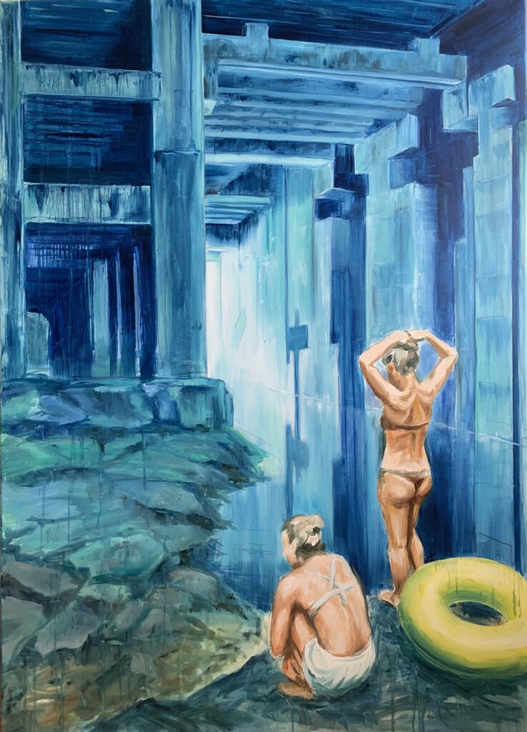 Oil painting depicting two women in swimwear in an abandoned, industrial, post-apocalyptic interior. One is standing, the other is crouching next to a green inflatable ring. The space resembles a decaying concrete structure, flooded with blue light. The scene evokes a sense of emptiness, alienation, and irreversible abandonment.